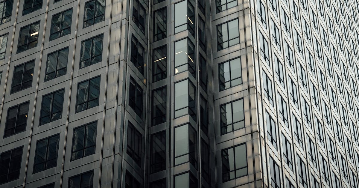 close up of a modern glass facade in london showcasing architectural symmetry and urban design